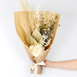 Hand holding Boho Style Dried Flower Bouquet by Flowers Across Australia